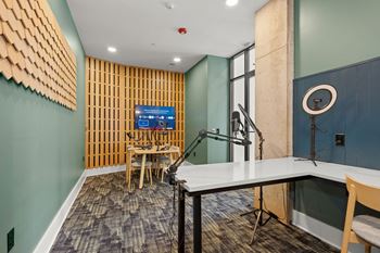 Media studio with workspaces